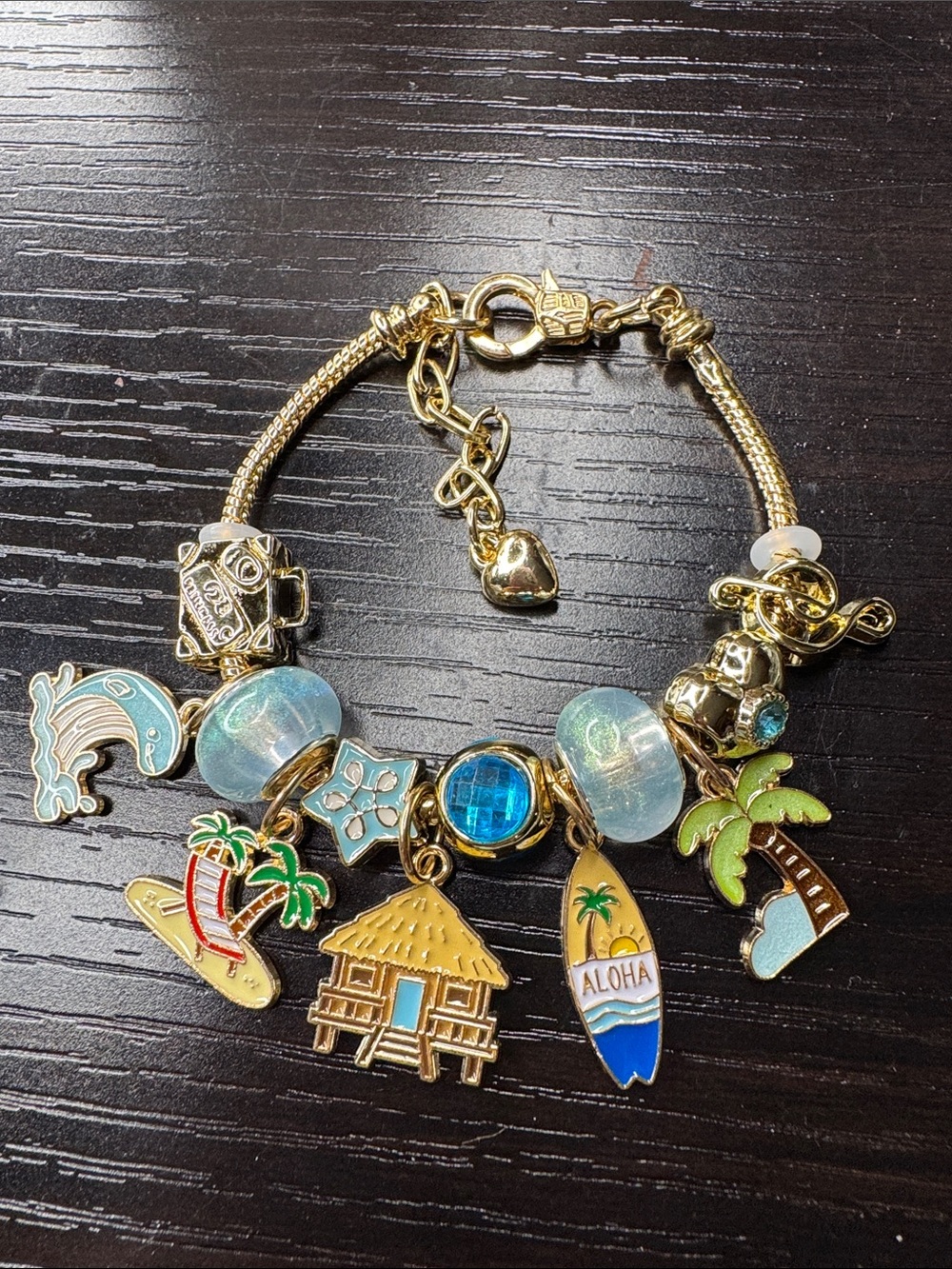 Gold-Tone Tropical Charm Bracelet with Blue & Green Accents